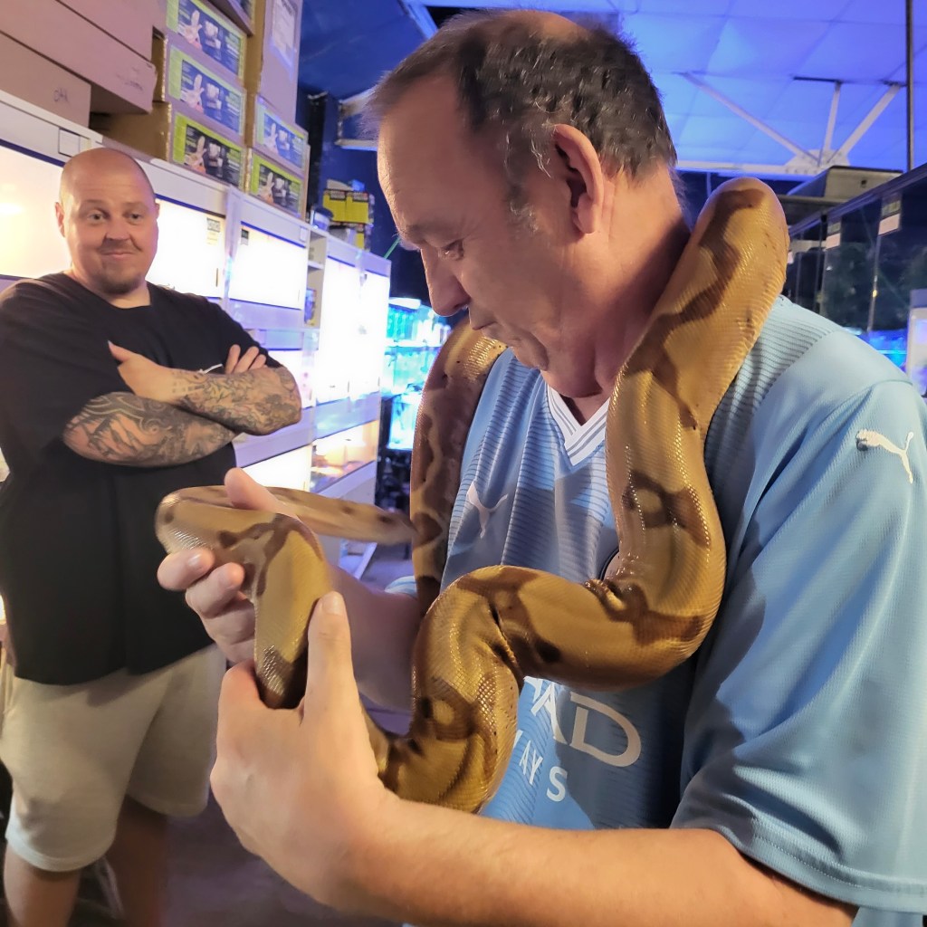 David holding a snake