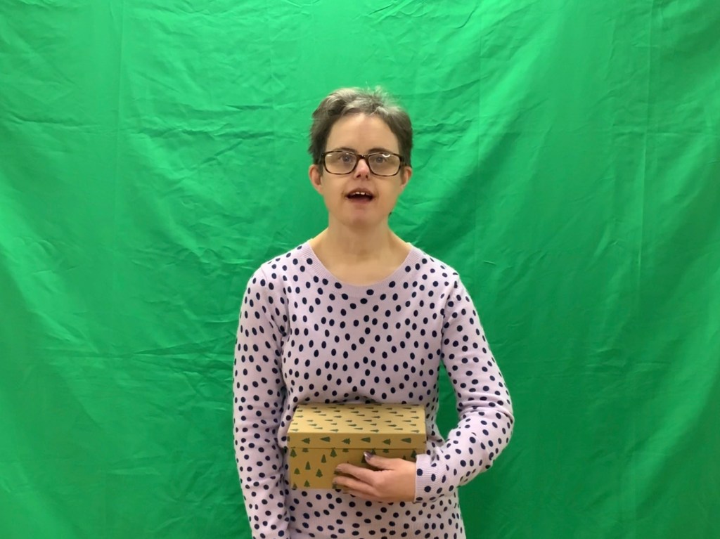 Vicky in front of the green screen