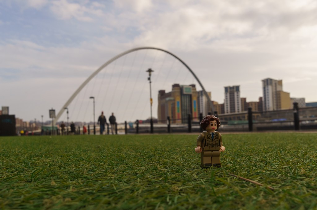 Lego man photo next to the River Tyne