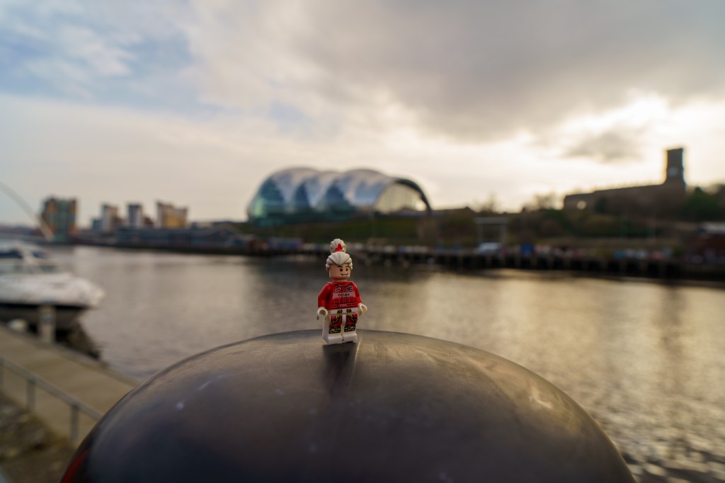 Lego man photo next to the River Tyne