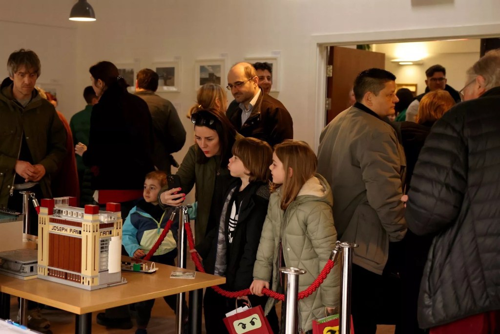 A photo from the opening night of the Wey Aye LEGO Man 2023 exhibition and LEGO architecture by Steve from BrickThis.
