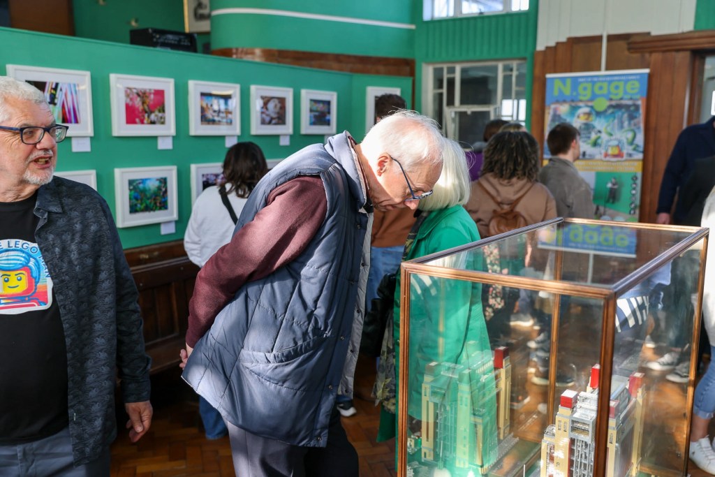 People enjoying LEGO portraits at the 2024 exhibition  