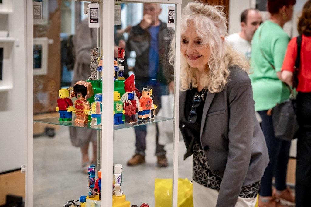 Attendee viewing the customised Lego figures 