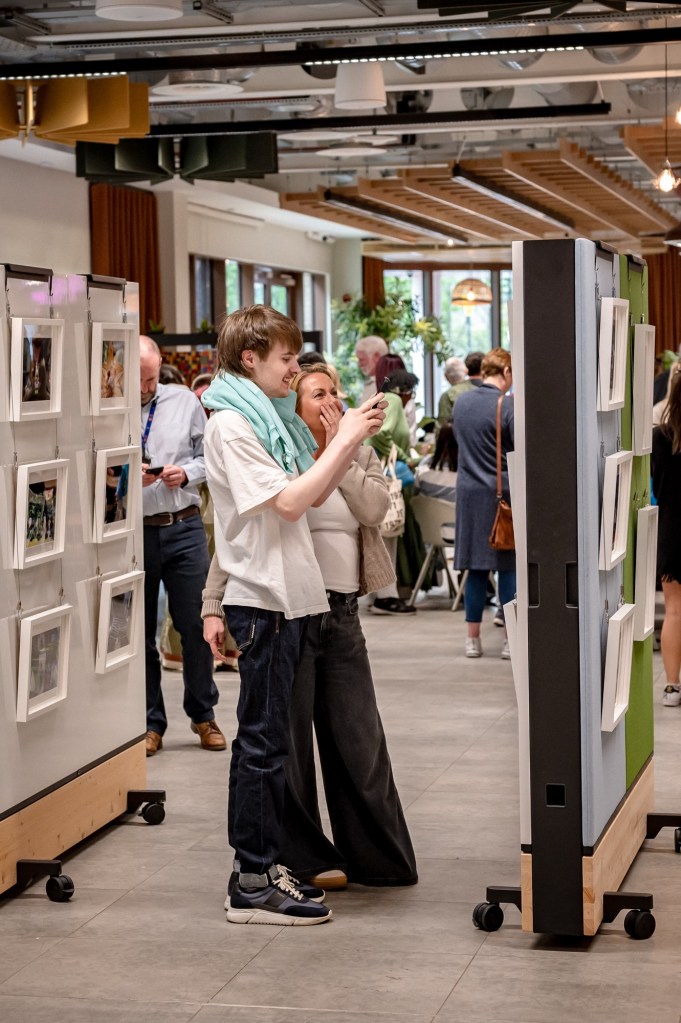 One of the artists seeing their art in the exhibition